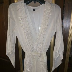 Size medium white  lace romper with bell sleeves